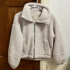 Never worn but took off the tags. In perfect condition with zero flaws